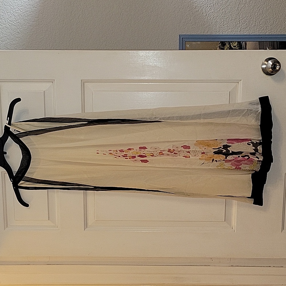 Halter dress size small cream with black trim and flower pattern